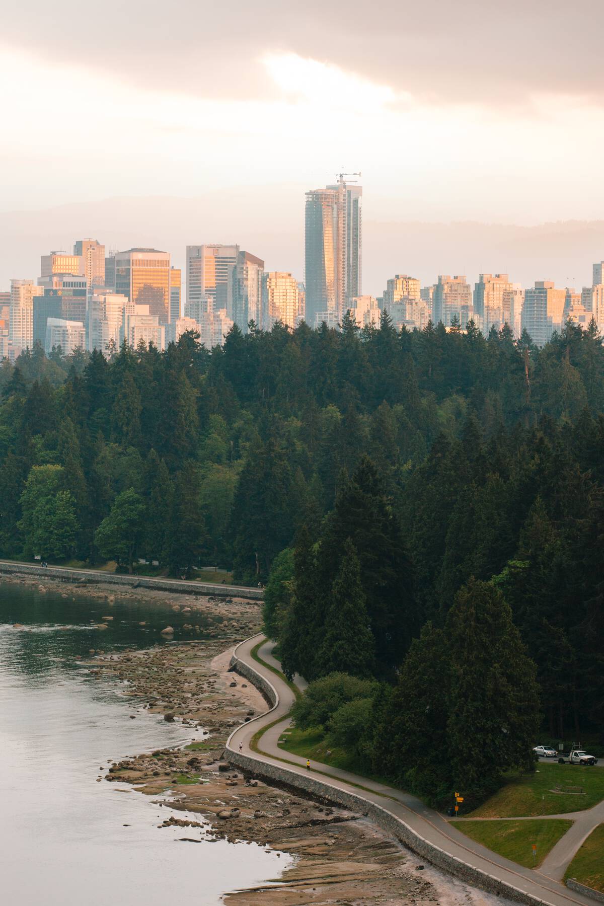 Stanley Park seawall and Vancouver skyline from Lions Gate Bridge