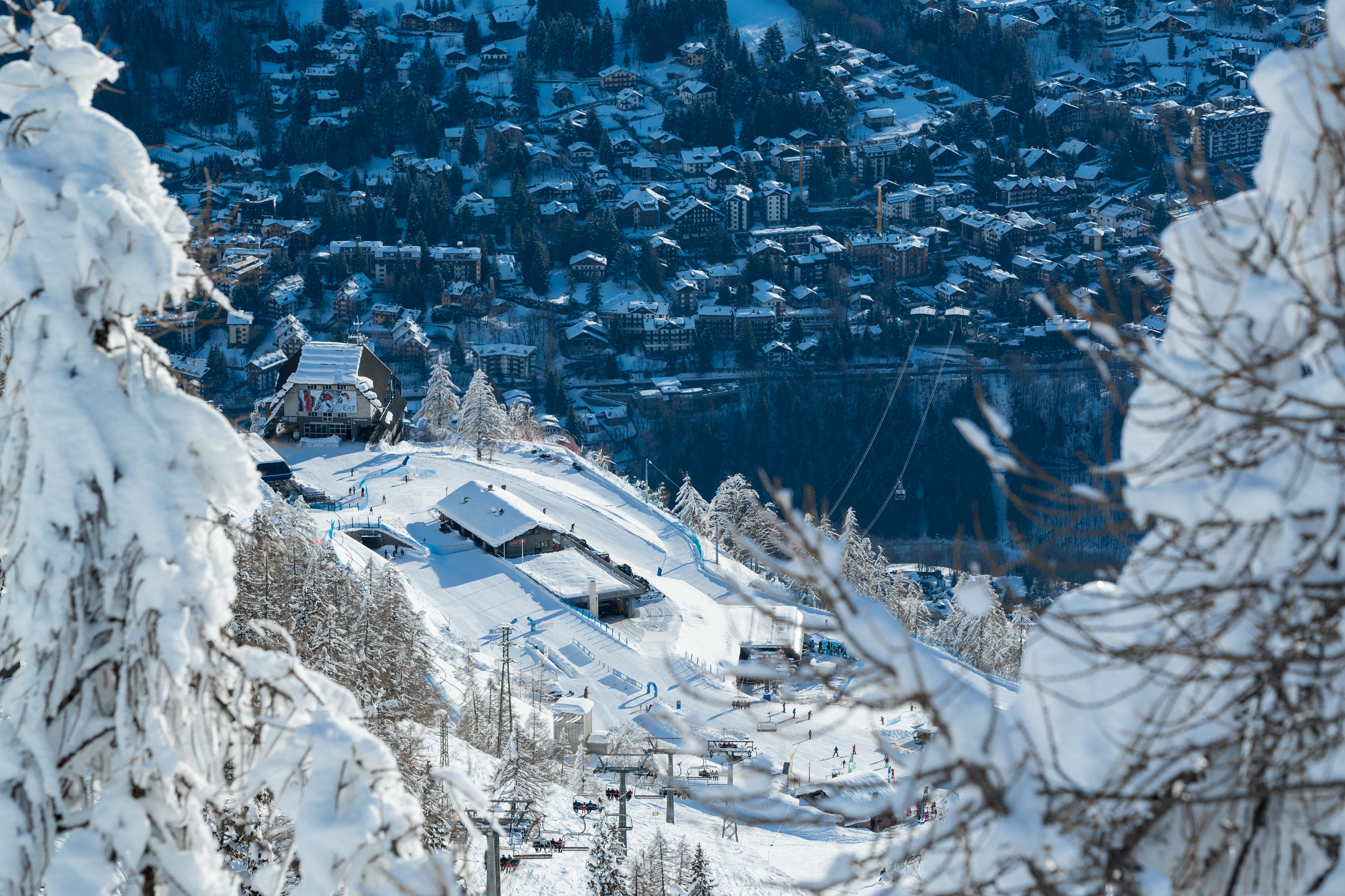 View of ski slopes and chalet buildings down to Courmayeur (courtesy of Courmayeur Mont Blanc)