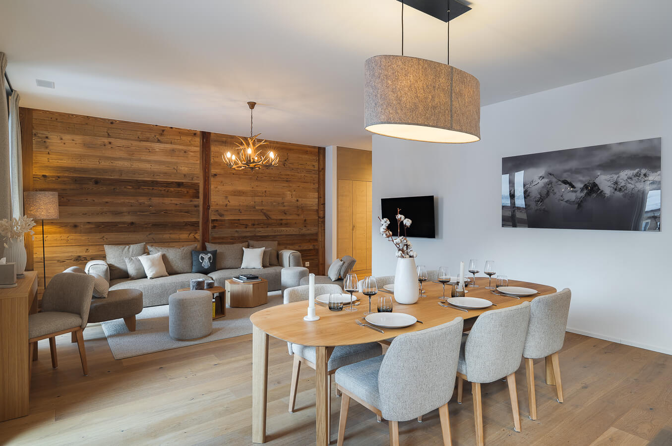 Steamboat Courchevel - light-filled open plan living space with sofas and dining table