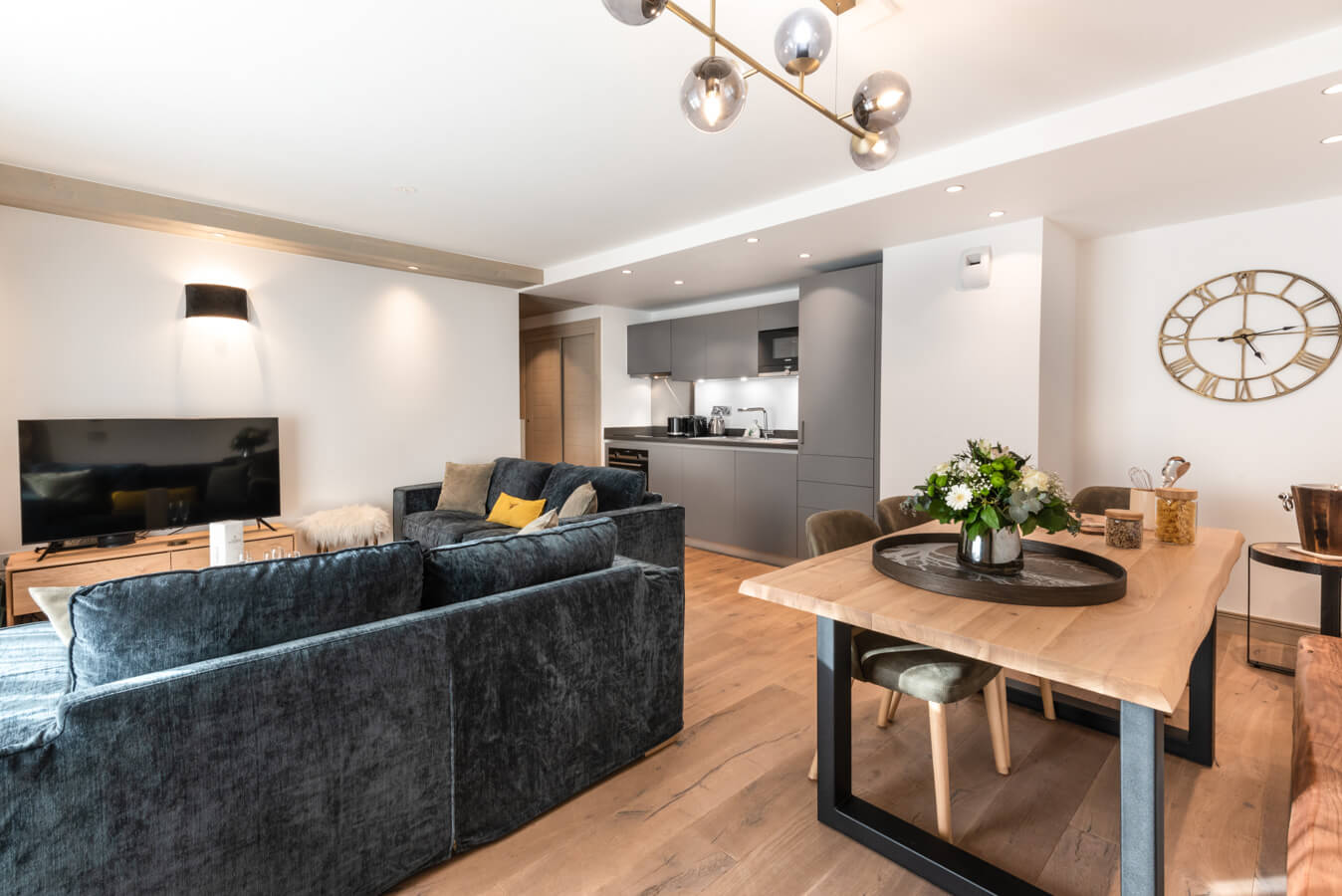 Steamboat Courchevel - modern living area with comfortable sofas and dining table
