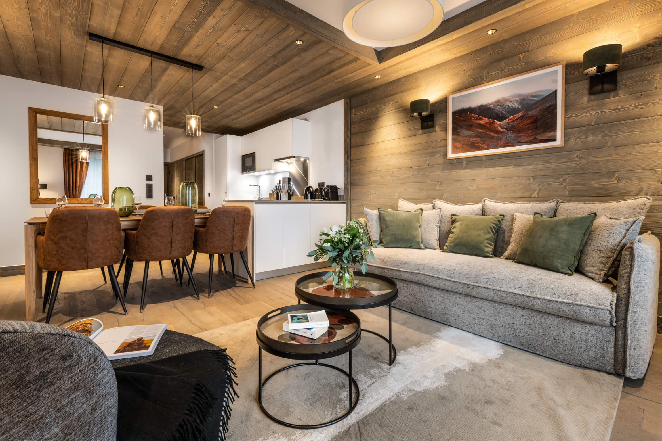 Sundance Courchevel - modern open plan living room with sofa and dining table