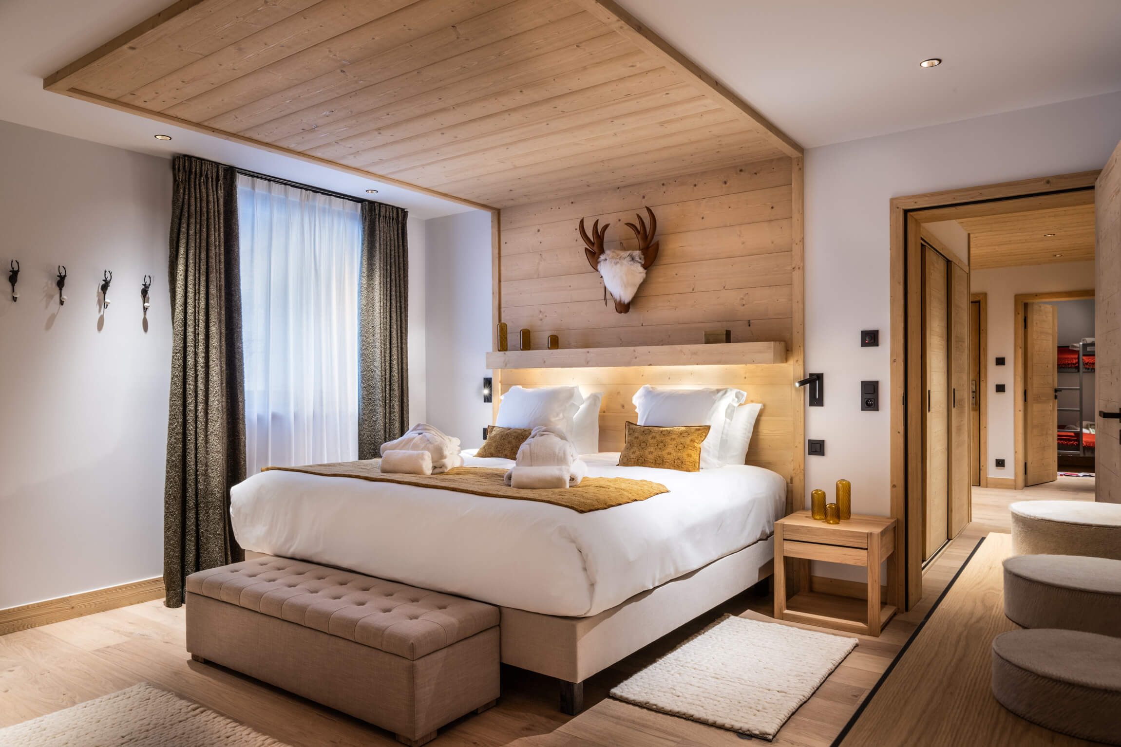 Sundance Courchevel - double bedroom with floor to ceiling windows