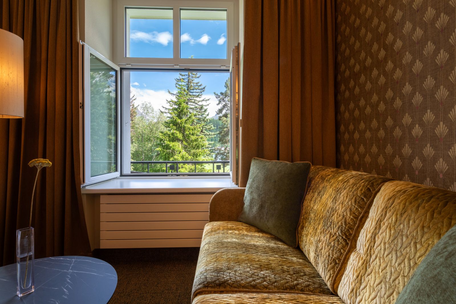 Hotel Cresta Palace, St Moritz - lounge area in art nouveau suite with sofa and coffee table