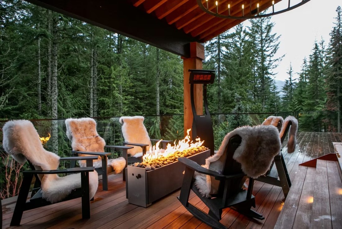 Falcon Cottage, Whistler, outdoor fireplace, forest view