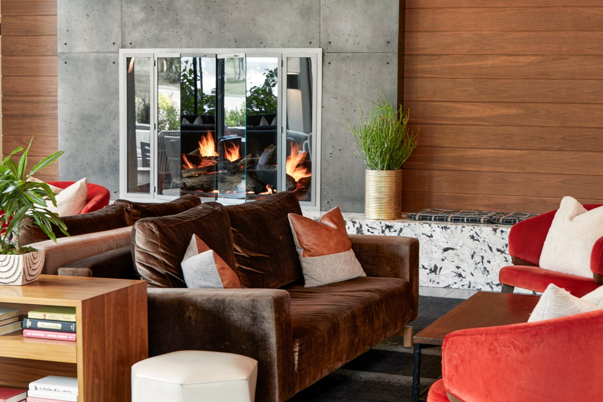 Limelight Aspen - cosy sitting area by fireplace in lobby
