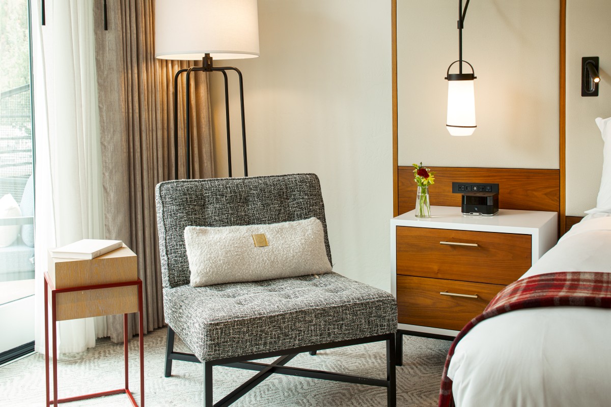 Limelight Aspen - small sitting area next to bed in room