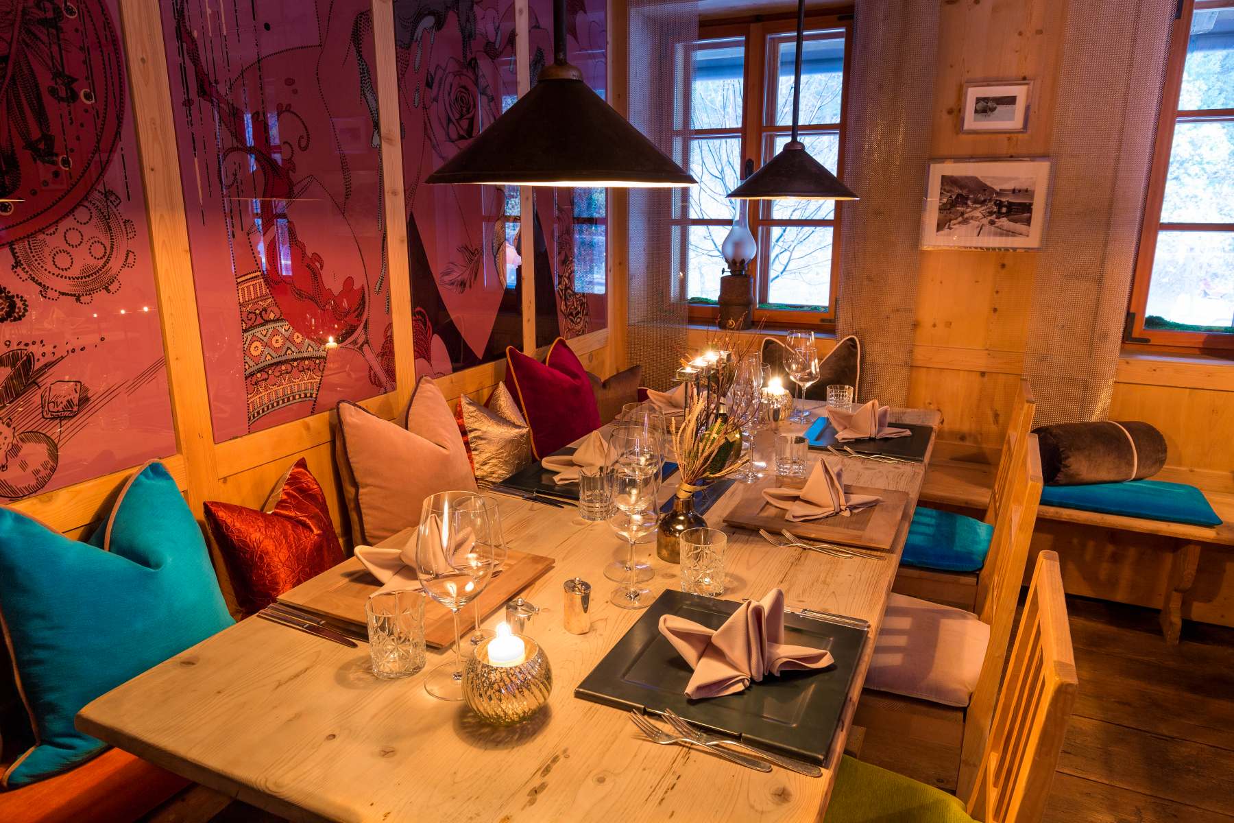 Raffl's St Antoner Hof, St Anton - restaurant with wooden furniture and bright cushions
