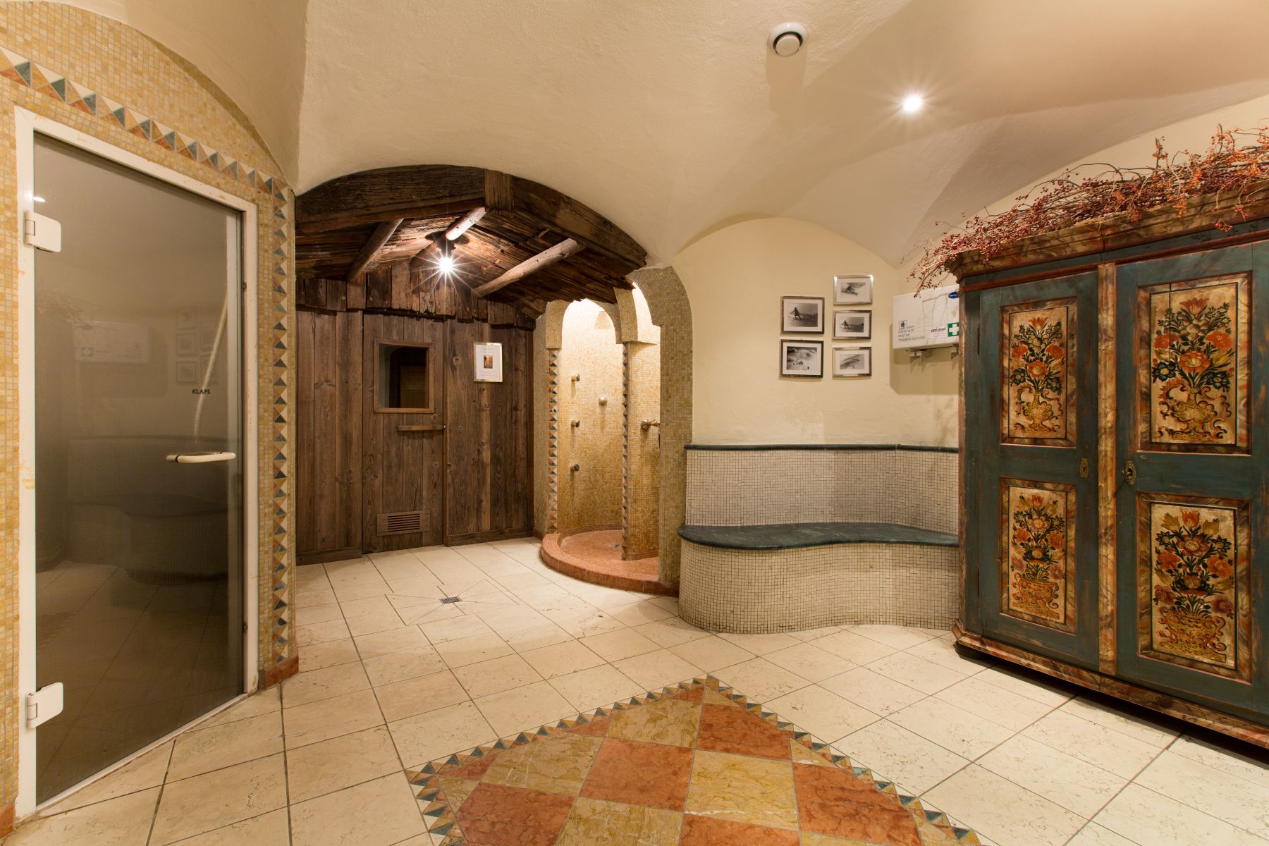 Raffl's St Antoner Hof, St Anton - spa area with entrance to steam room and traditional Tyrolean furniture