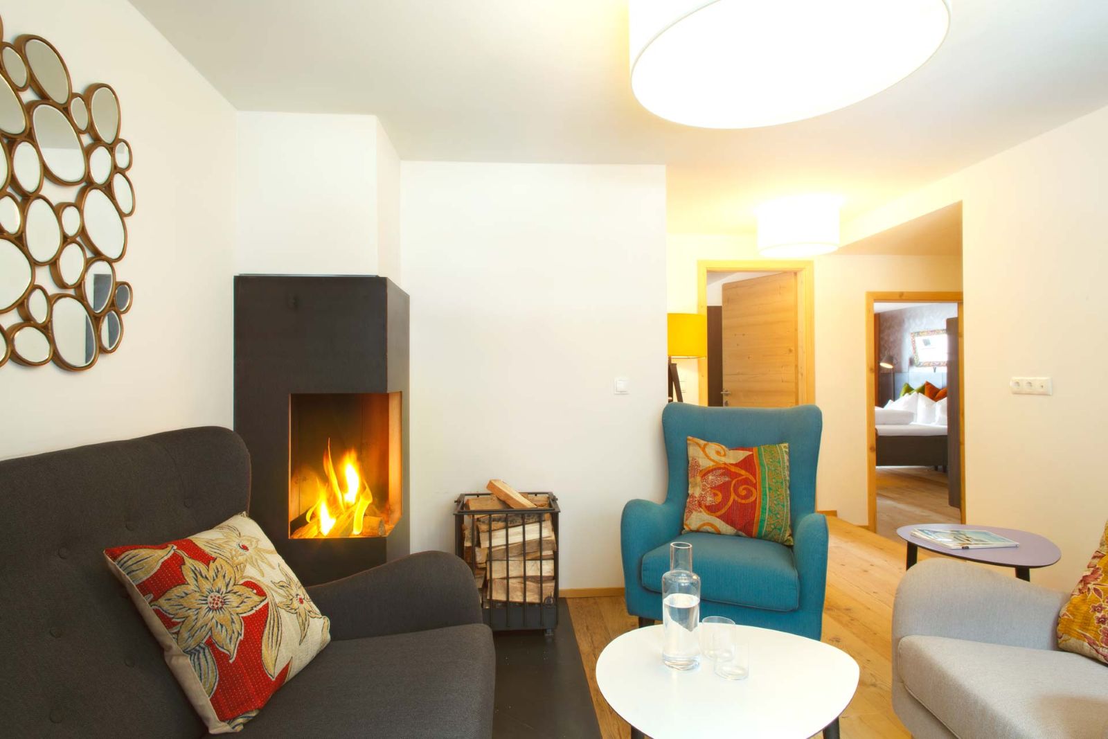 Raffl’s Tyrol Hotel, St Anton - suite with lounge area and fireplace