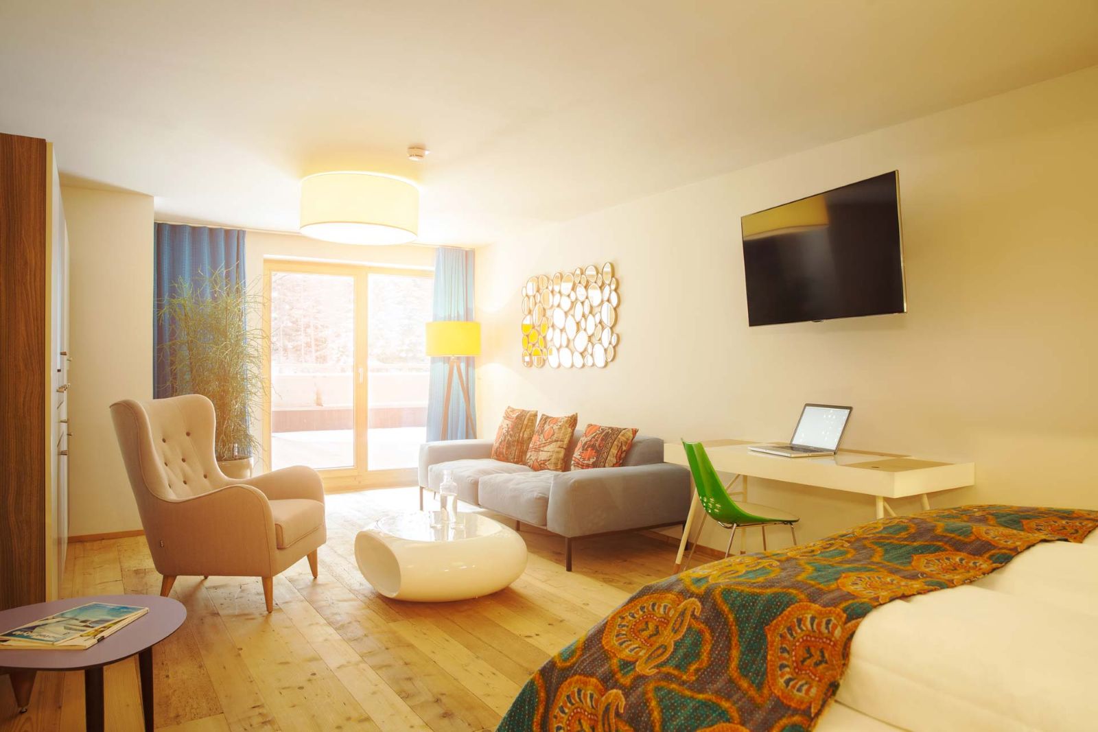 Raffl’s Tyrol Hotel, St Anton - large double room with sofa and armchair