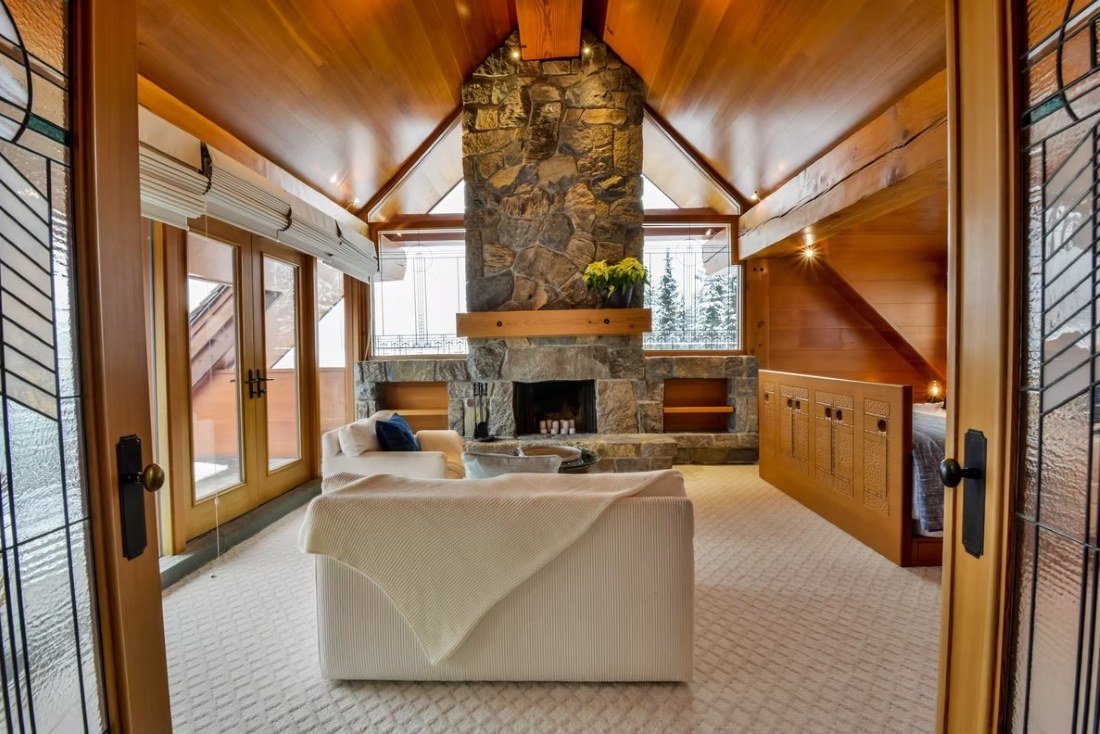 Totem Chalet, Whistler, primary suite, fireplace, living room